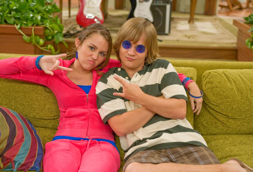 Miley Cyrus and Jason Earles on set of Hannah Montana