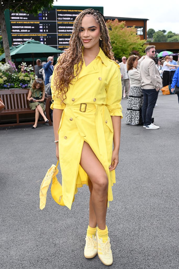 Yasmin Finney bright yellow coat and shoes