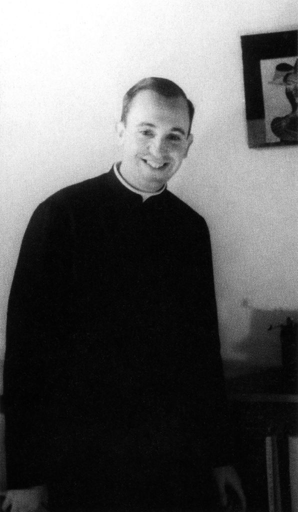 priest smiling in robe 