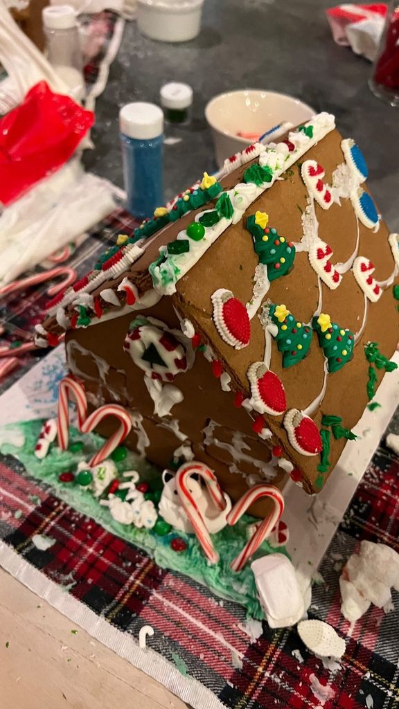 Kourtney Kardashian shared a photo of her hand decorated gingerbread house