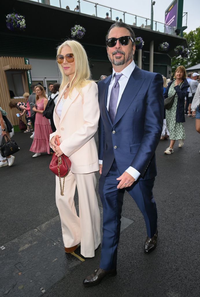 dave grohl and jordyn blum walking at wimbledon 2025