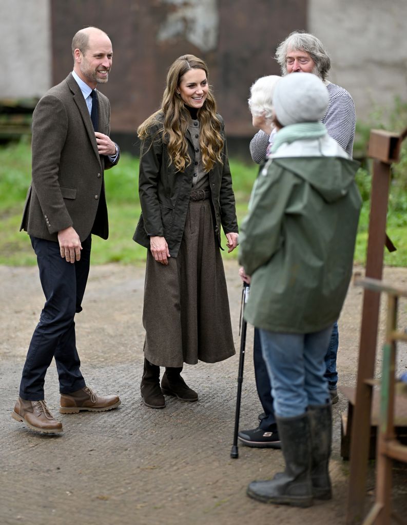 William and Kate meet with farm owner Charlie Mallon (R) and his family