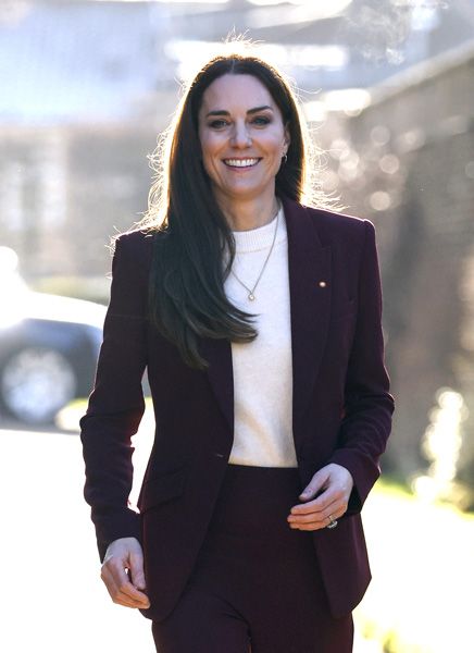 Kate Middleton smiling at Hampton Court palace 