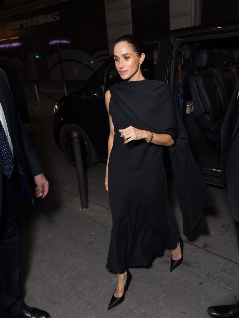 Meghan Markle wearing black dress in Paris
