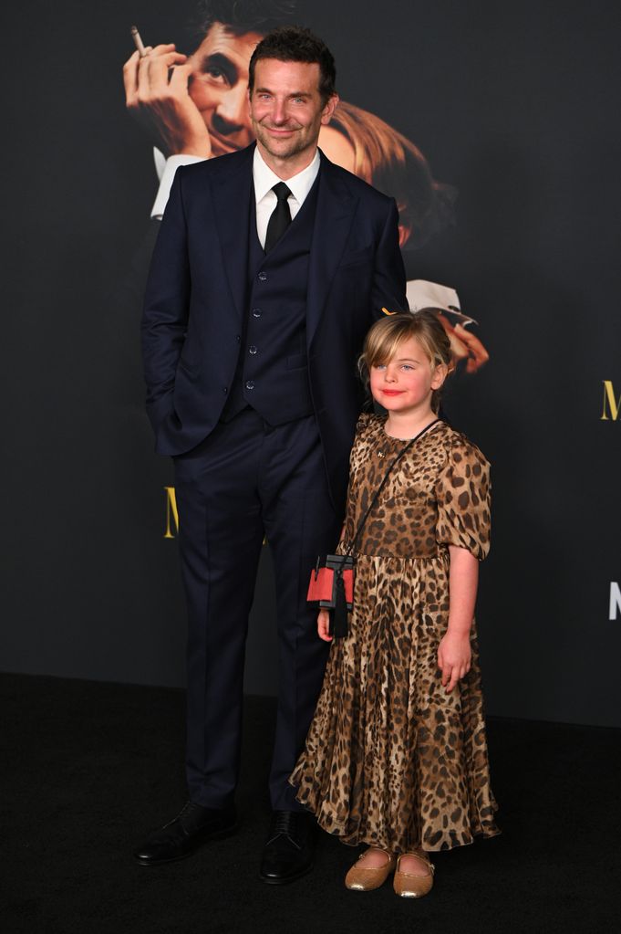 Bradley Cooper, in a Louis Vuitton suit, alongside his and Irina Shayk's daughter, Lea De Seine Shayk Cooper 
