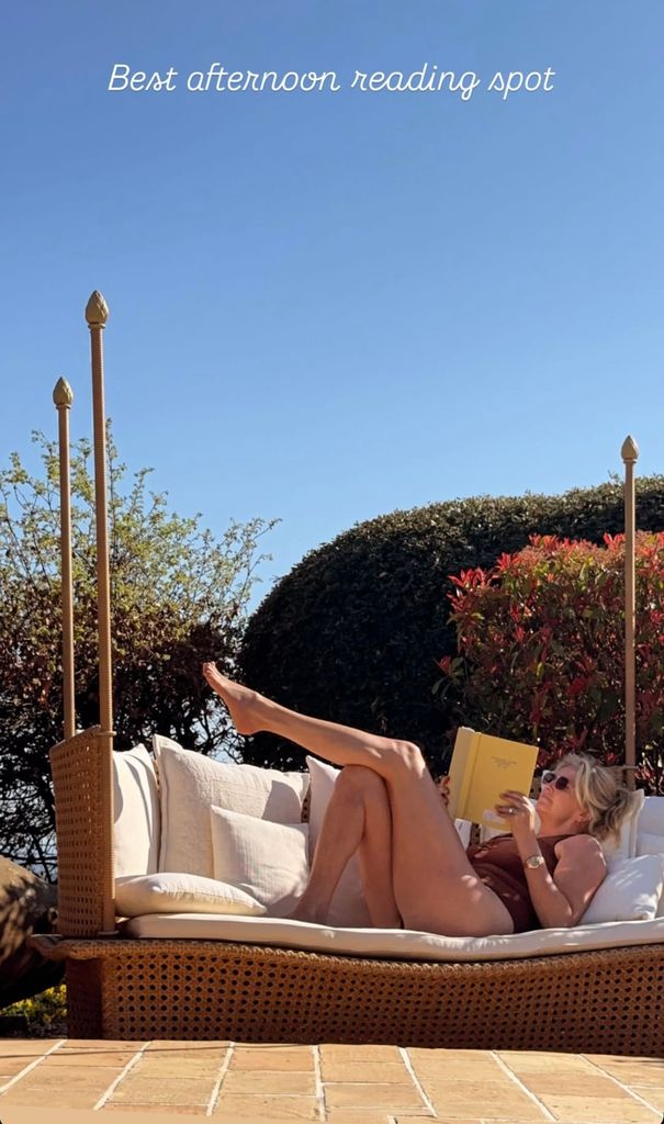 Penny Lancaster on holiday in a brown swimsuit