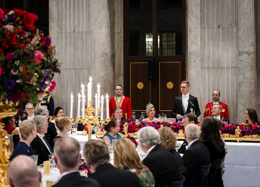 Finland's President Alexander Stubb (L) delivers a speech during a state banquet at the Royal Palace in Amsterdam on the first day of Stubb's two-day state visit to the Netherlands. (Photo by Remko de Waal / ANP / AFP via Getty Images) / Netherlands OUT