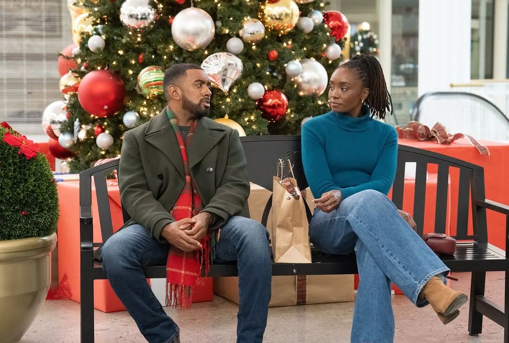 Kiki Layne (R) in Fake Yourself a Merry Little Christmas