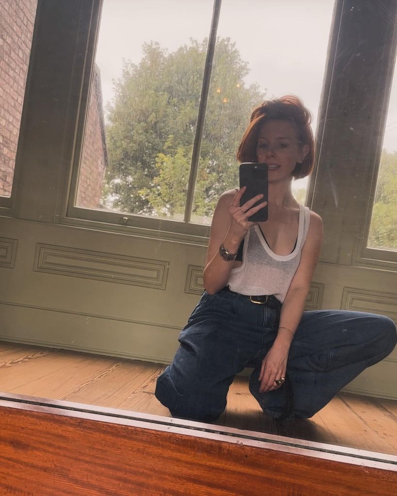 stacey dooley taking mirror selfie 