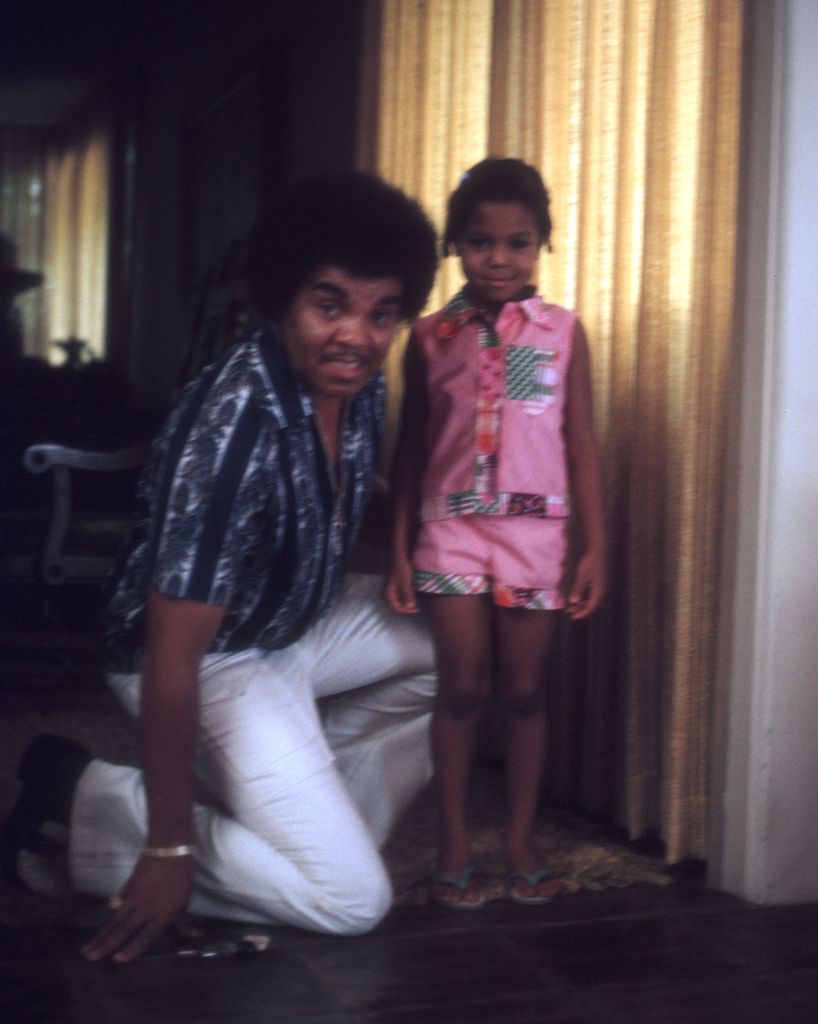 Pop singer and actress Janet Jackson poses for a portrait with her father, Joe Jackson, in August 1972 in Los Angeles, California