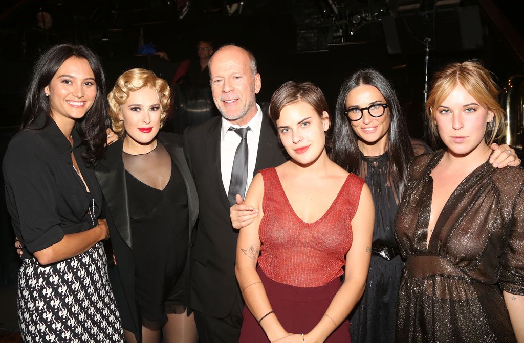 NEW YORK, NY - SEPTEMBER 21:  (EXCLUSIVE COVERAGE) (L-R) Emma Heming, Rumer Willis, father Bruce Willis, sister Tallulah Belle Willis, mother Demi Moore and sister Scout LaRue Willis pose backstage as Rumer makes her broadway debut as "Roxie Hart" in Broadway's "Chicago" on Broadway at The Ambassador Theater on September 21, 2015 in New York City.  (Photo by Bruce Glikas/FilmMagic)