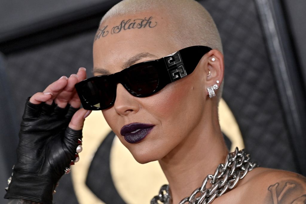 Amber Rose formerly dated A.E., and they share Slash