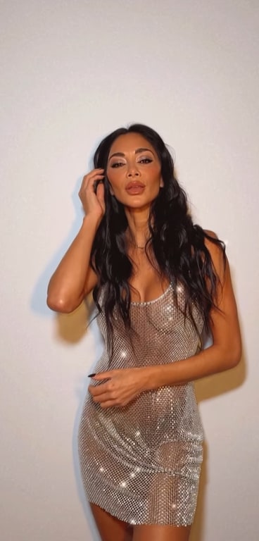 Nicole in a chainmail dress