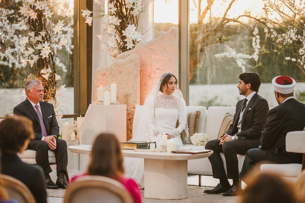 The King of Jordan sat with iman in wedding dress