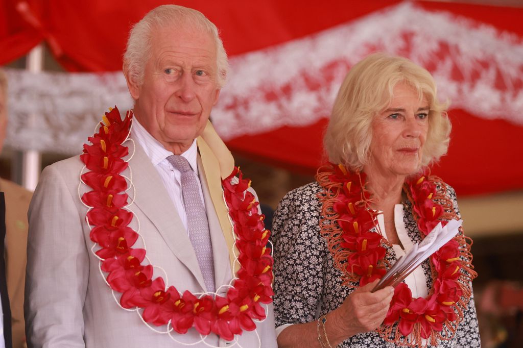 King Charles III and Queen Camilla attend a farewell ceremony on the final day of the royal visit to Australia and Samoa at the Siumu Village