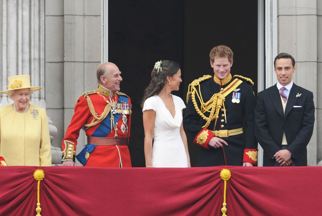 Queen Elizabeth II, Prince Philip, Duke of Edinburgh, Pippa Middleton, Prince Harry and James Middleton look at the crowds from the balcony of Buckingham Palace 