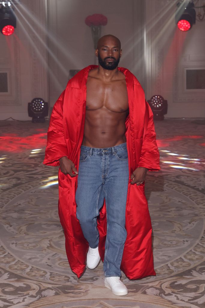 Tyson Beckford walks the runway during L'Scher Paris Fashion Week Street Couture Show at Four Season George V on July 04, 2023 in Paris, France.