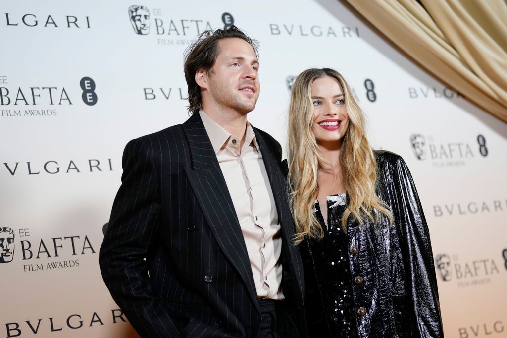 Tom Ackerley and Margot Robbie attend the EE BAFTA Film Awards 2024 Nominees' Party, Supported By Bulgari at The National Gallery on February 17, 2024 in London, England