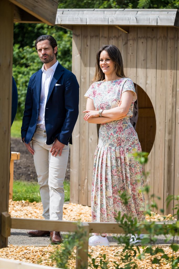 Princess Sofia with her arms crossed in a floral dress