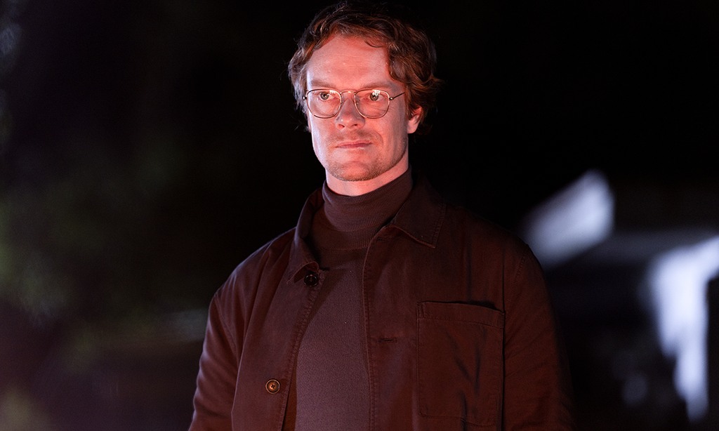 man in glasses close-up