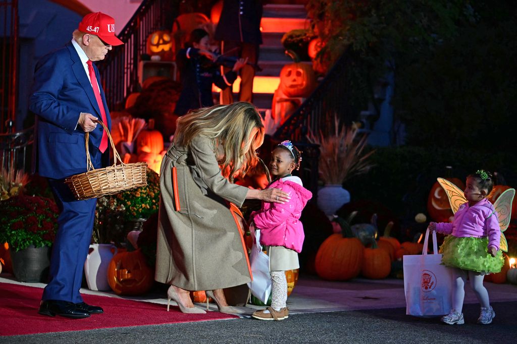 The first lady comforted a young child at the event on Oct. 30