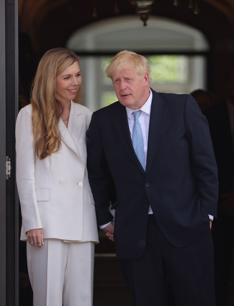 Carrie Johnson standing with Boris Johnson