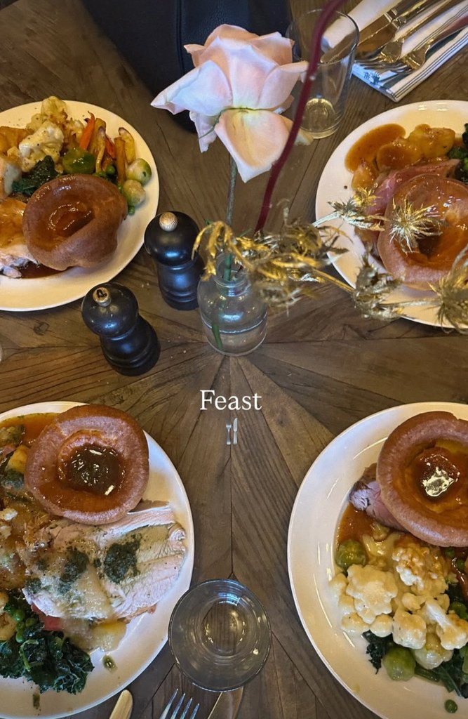 A picture of roast dinner complete with yorkshire puddings, captioned "feast."