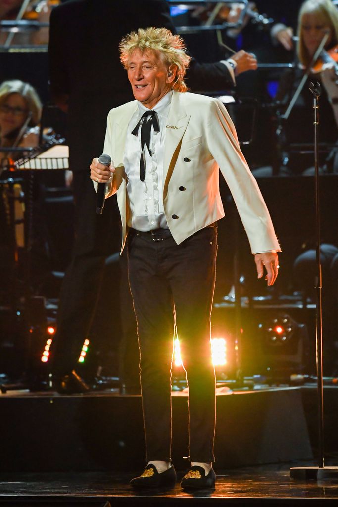 Rod Stewart in white suit