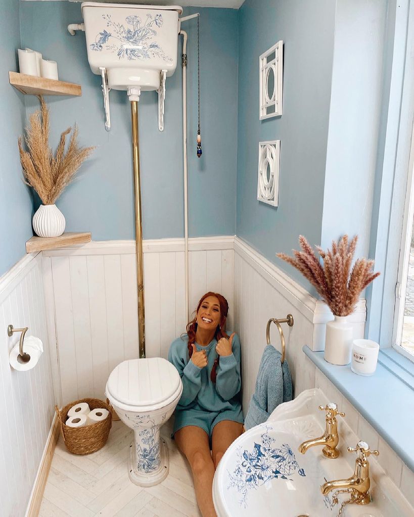 Stacey sitting in her blue loo 