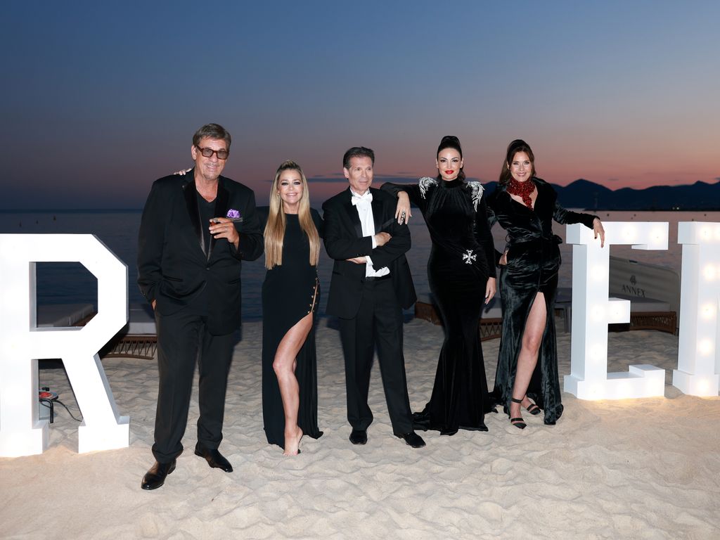 Robert Davi, Denise Richards, Robert Gillings, Bleona and Carol Alt attend the "Paper Empire" Tv Show Event at Annex Beach on April 18, 2023 in Cannes, France