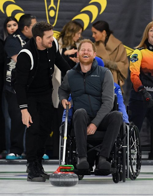 Prince Harry and Michael Buble share a joke