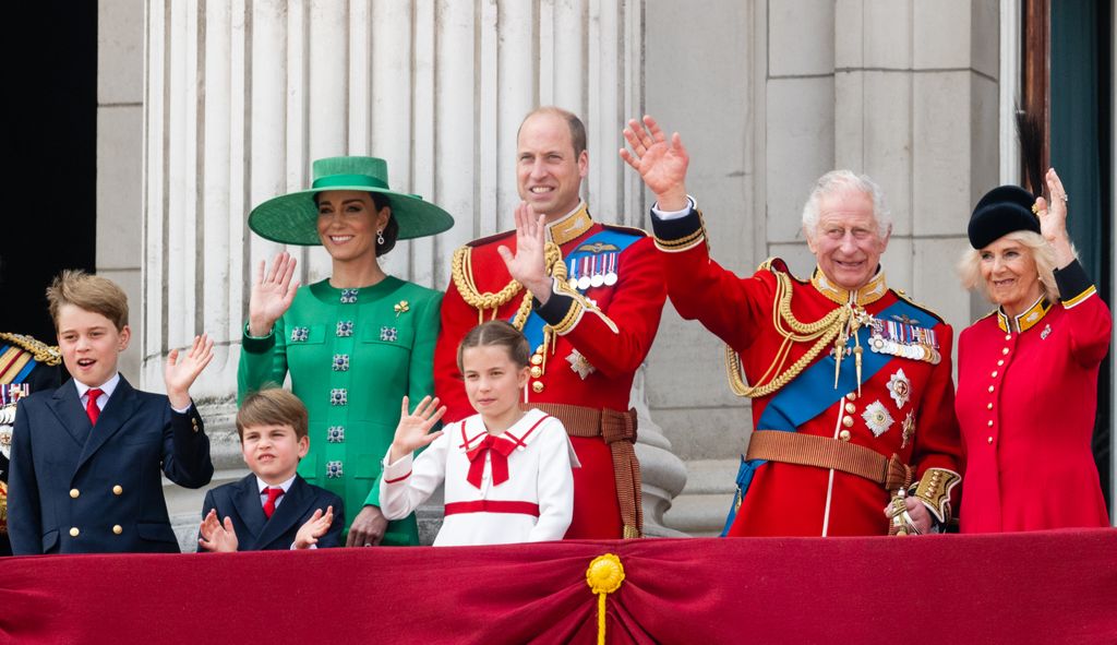 Member of the British Royal Family standing on a balcony