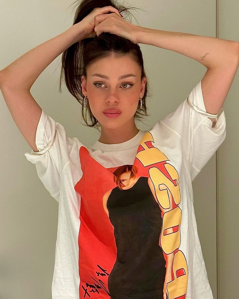 Nicola shared an image on Instagram wearing the iconic t-shirt