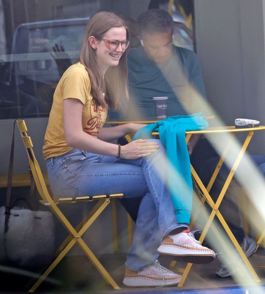 Violet wore in yellow top and jeans