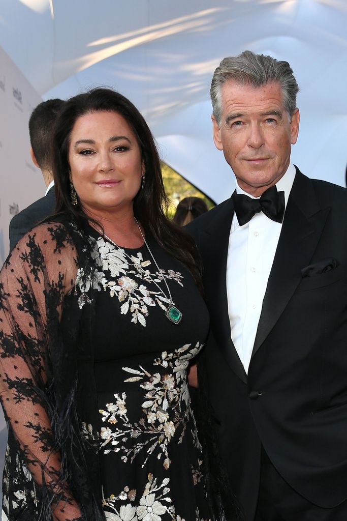 Keely Shaye Smith and Pierce Brosnan arrive at the amfAR Gala Cannes 2018 at Hotel du Cap-Eden-Roc on May 17, 2018 in Cap d'Antibes, France