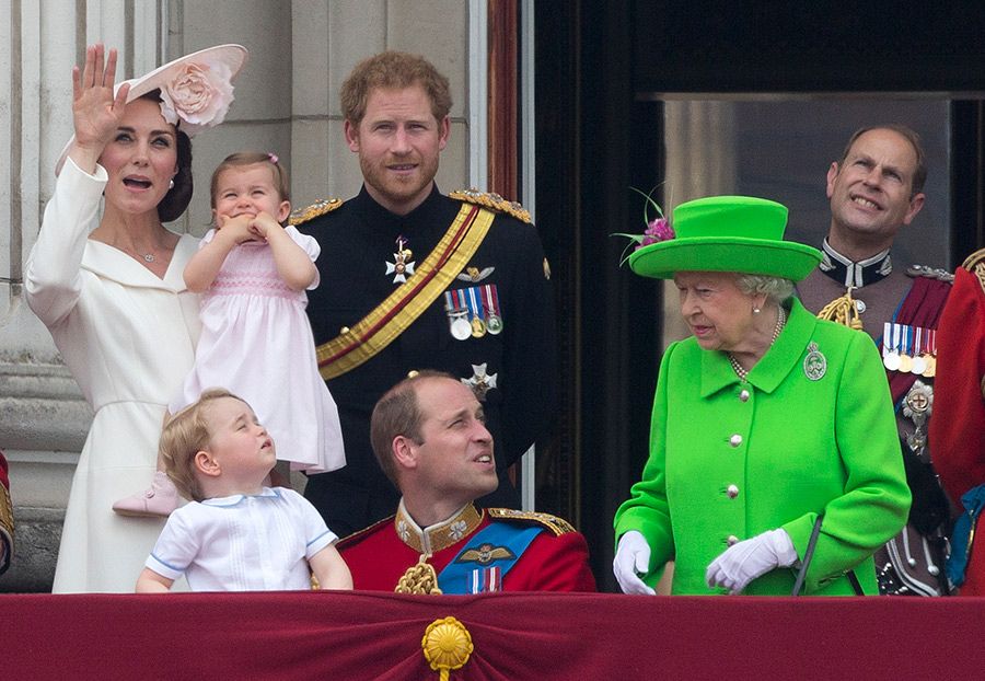 prince william crouches down to george at trooping the colour
