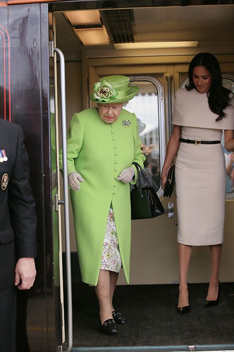 queen coming out of royal train