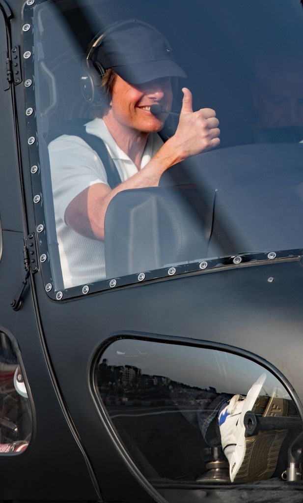 Tom Cruise arriving back in London on a helicopter after jetting off after the closing ceremony at the Olympics in Paris for a weeks holiday 