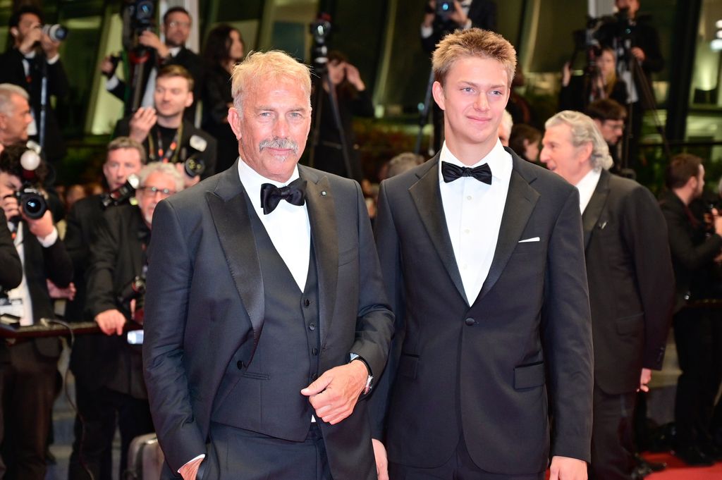 Kevin Costner and Cayden Wyatt Costner depart the "Horizon: An American Saga" Red Carpet at the 77th annual Cannes Film Festival at Palais des Festivals on May 19, 2024 in Cannes, France.