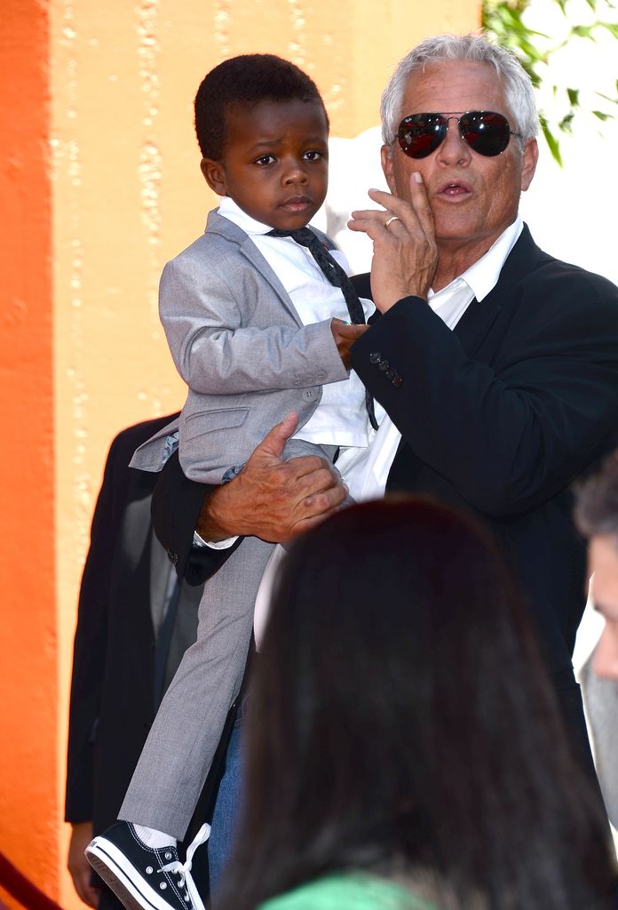 Sandra Bullock's son Louis Bardo Bullock is seen as Bullock is immortalized with a hand and footprint ceremony at TCL Chinese Theatre on September 25, 2013 in Hollywood, California