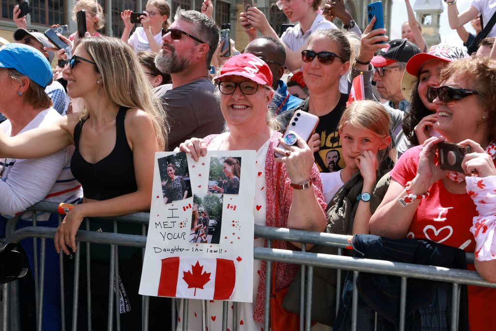 Royal fan holding up picture of Princess of Wales in Ottawa