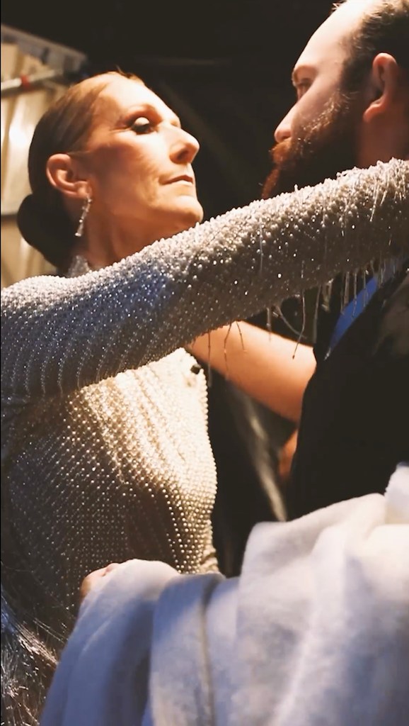 Celine Dion seen hugging her son René-Charles Angélil after her performance at the Paris Olympic Games Opening Ceremony