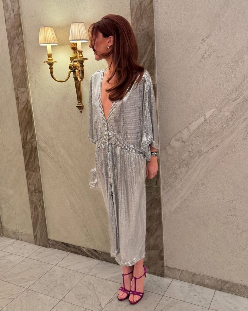 verona farrell in silver dress