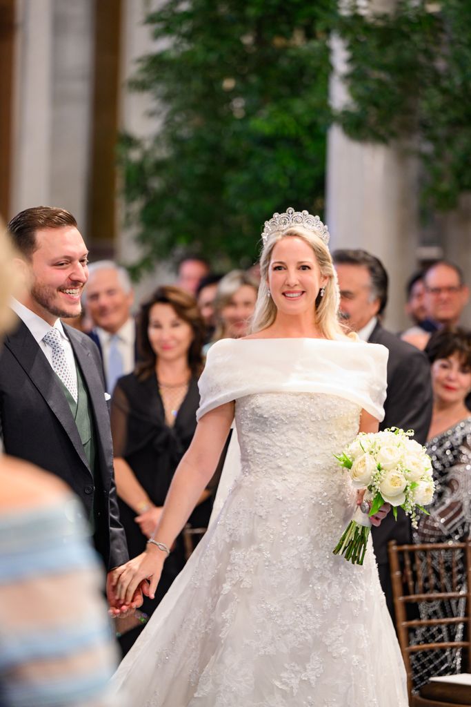 bride and groom walking down aisle