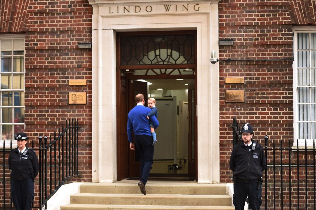 Prince William carried Prince George into the Lindo Wing where his wife gave birth to Princess Charlotte in 2015