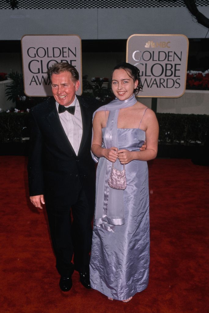 Martin Sheen in black suit and his granddaughter Cassandra Estevez  in purple dress arriving at the 57th Annual Golden Globe Awards 