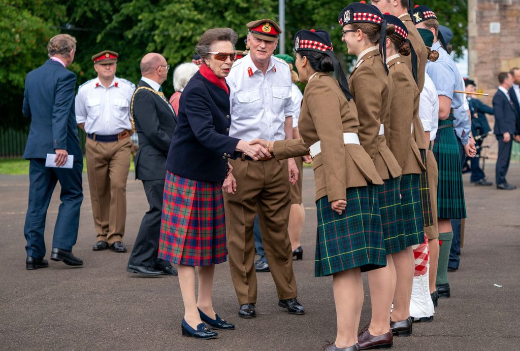 The Princess Royal meets performers during a rehearsal for this year's Royal Edinburgh Military Tattoo at Redford Barracks in Edinburg
