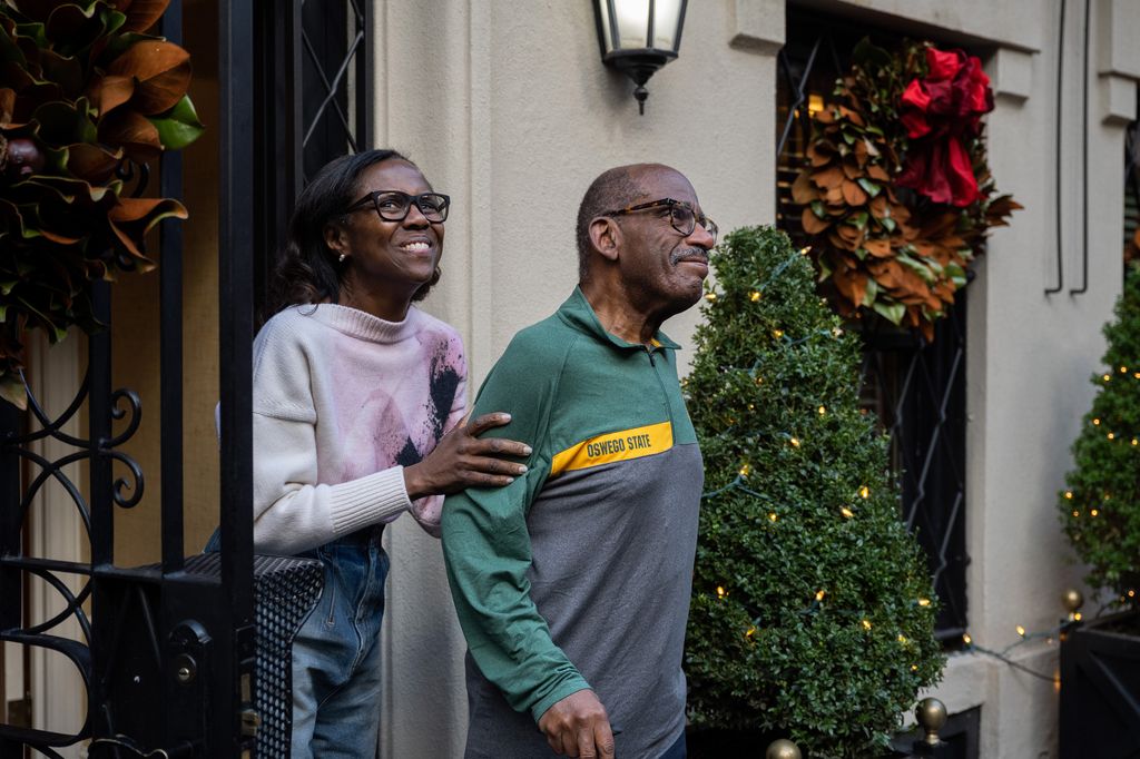 Deborah Roberts and Al Roker during a Christmas caroling surprise on Wednesday, December 14, 2022