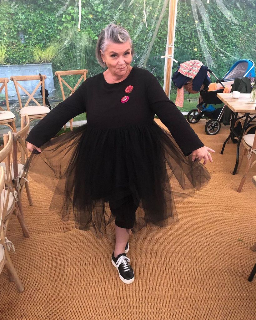 Dawn French wearing a black netted dress