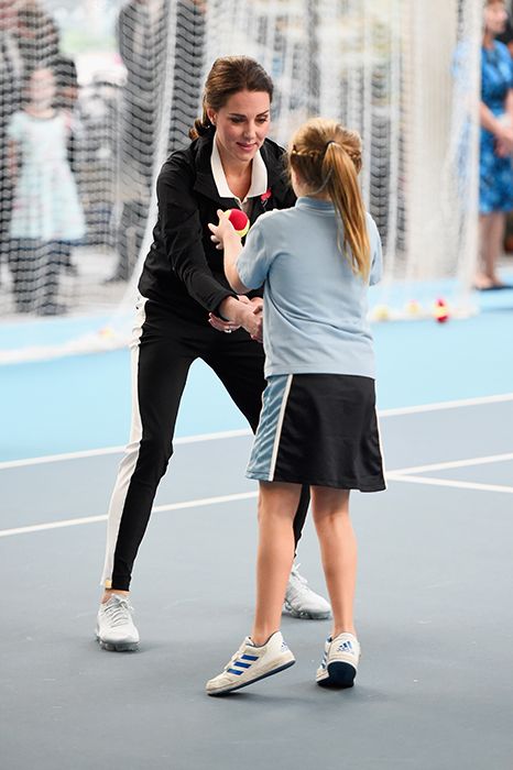 kate middleton helps young girl on tennis engagement